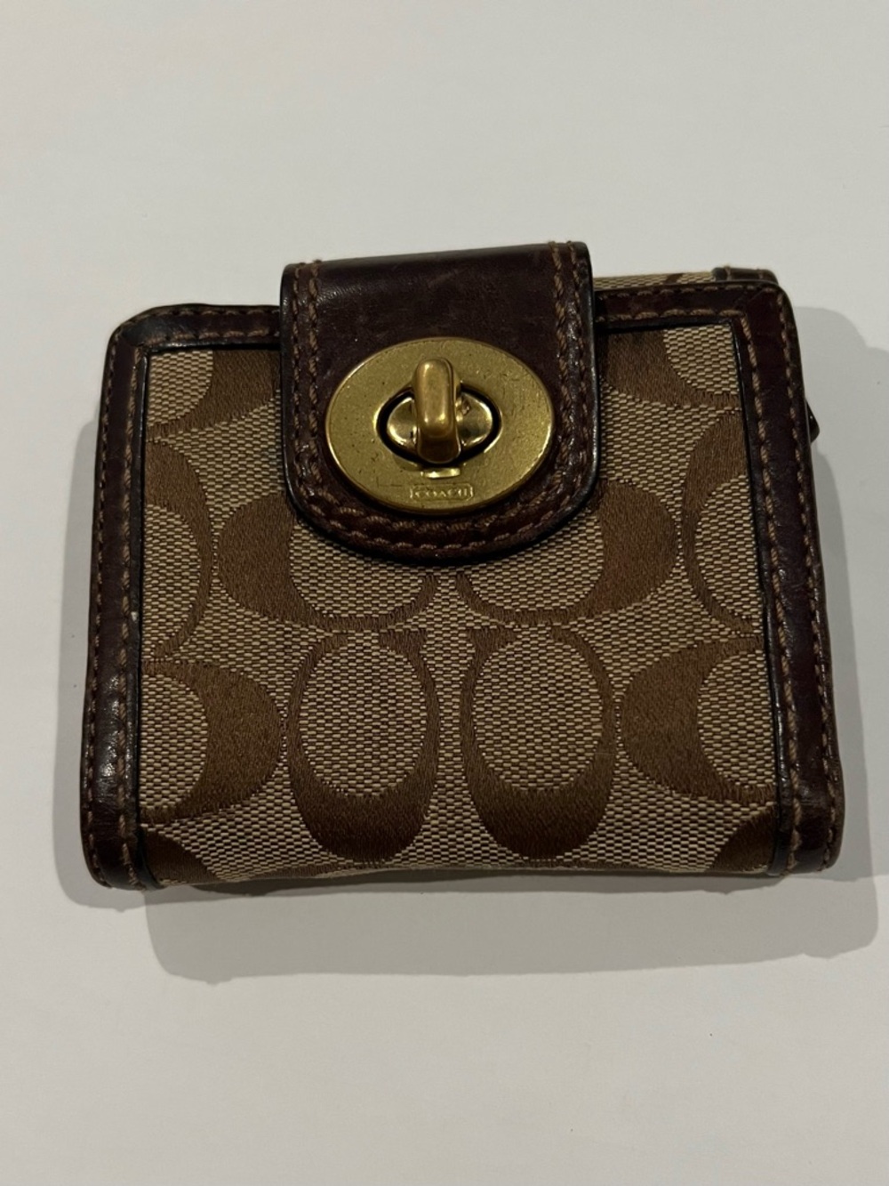 Coach Signature Brown Canvas bifold Wallet with Brass Turnlock